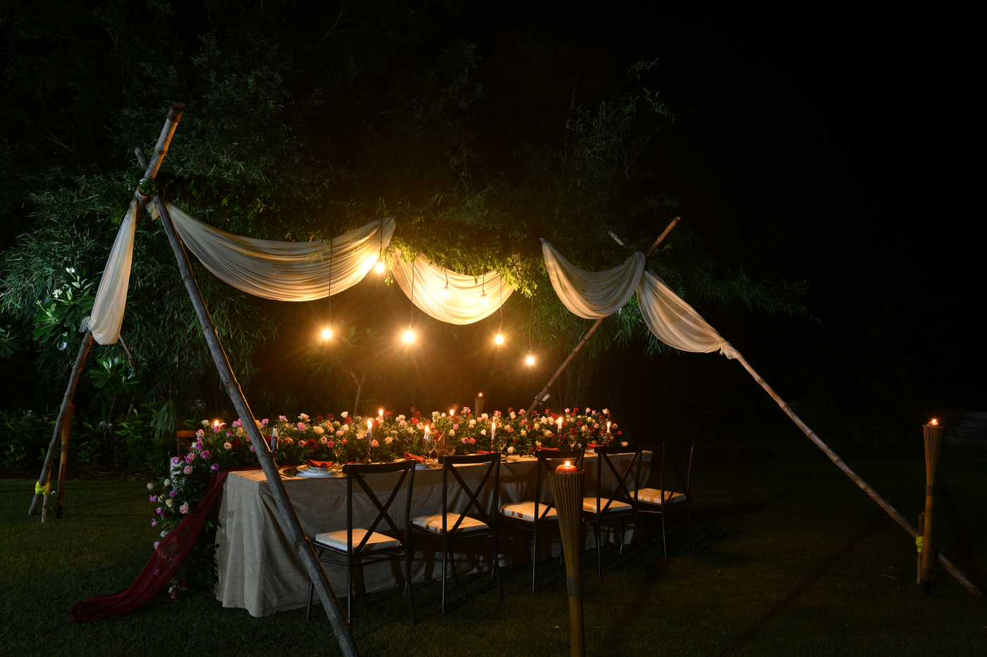 Evening event dining setup at the SilverOak Club Infinity venue